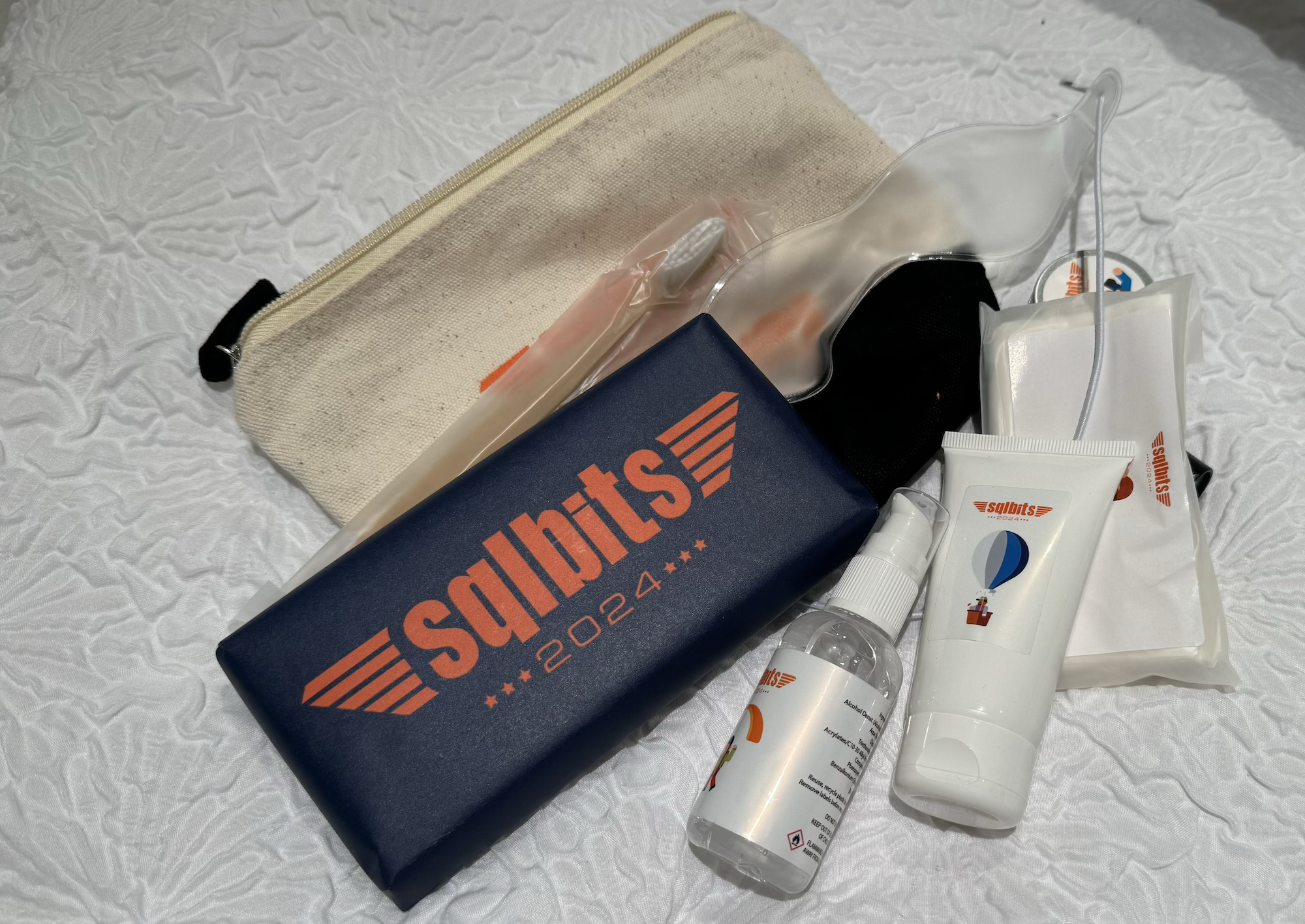 the helper swag bag includes lots of toiletries and a huge chocolate bar