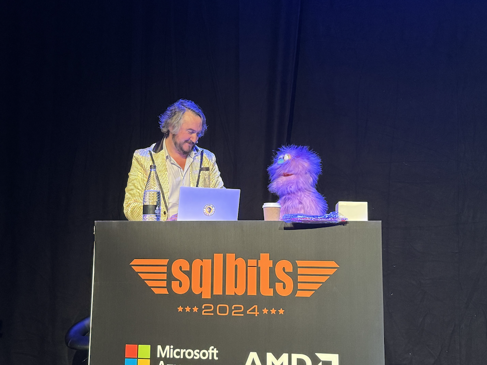 A picture of Simon hosting the nose dive narratives along with Fab Rick