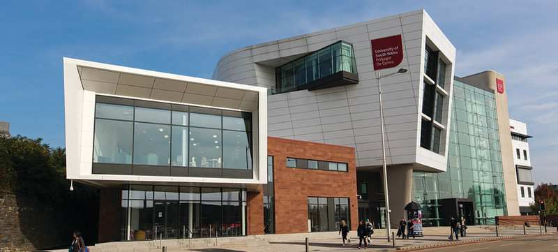 A photo of the university of south wales atrium building, it's a modern building with a very distinctive design.